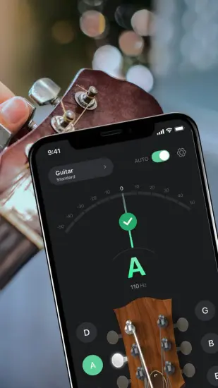 The Tuner Pro app showing an acoustic guitar string perfectly in tune.