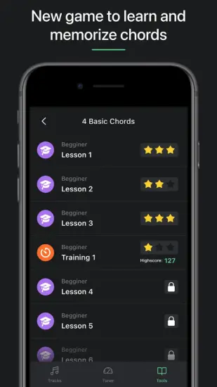 The Tuner Pro app's game feature for learning chords, showing a list of beginner lessons with a star rating system to track progress.